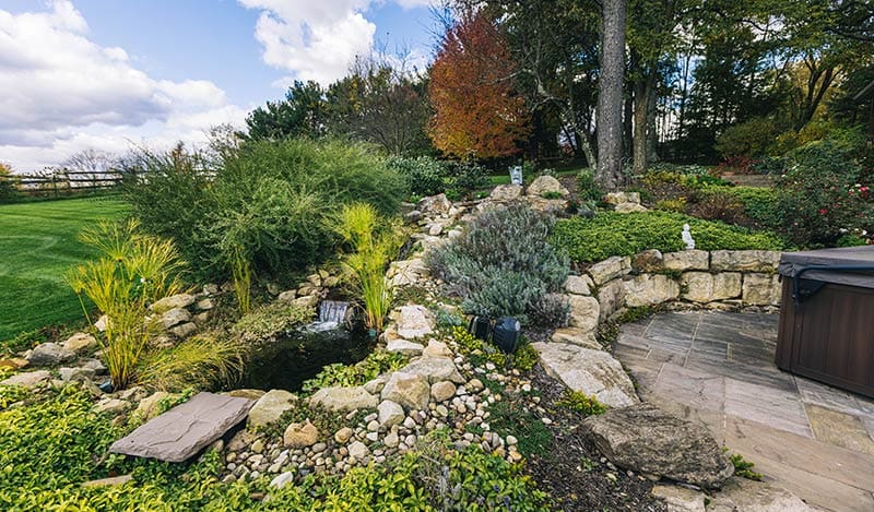 natural-stone-retaining-wall-pittsburgh-35 retaining wall and patio to house hot tub